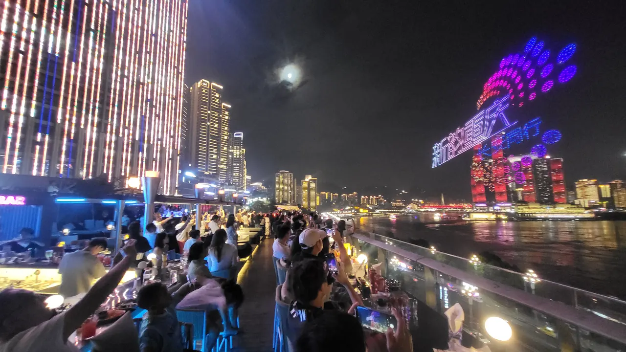 Drone lights over Chongqing’s riverfront at night