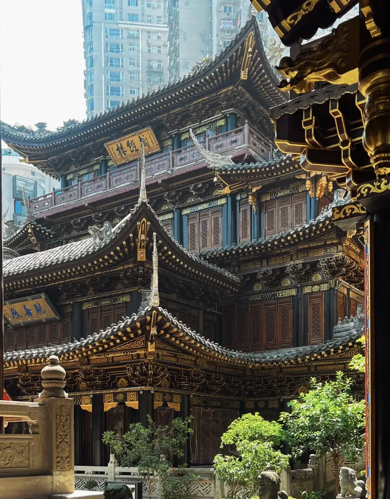 The Scripture Building in Luohan Temple above layered roofs, courtyard trees and stone balustrades
