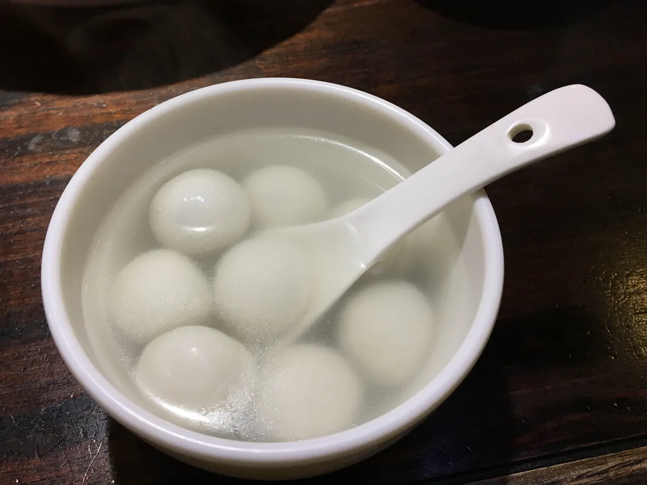 Glutinous rice balls in a bowl of sweet soup